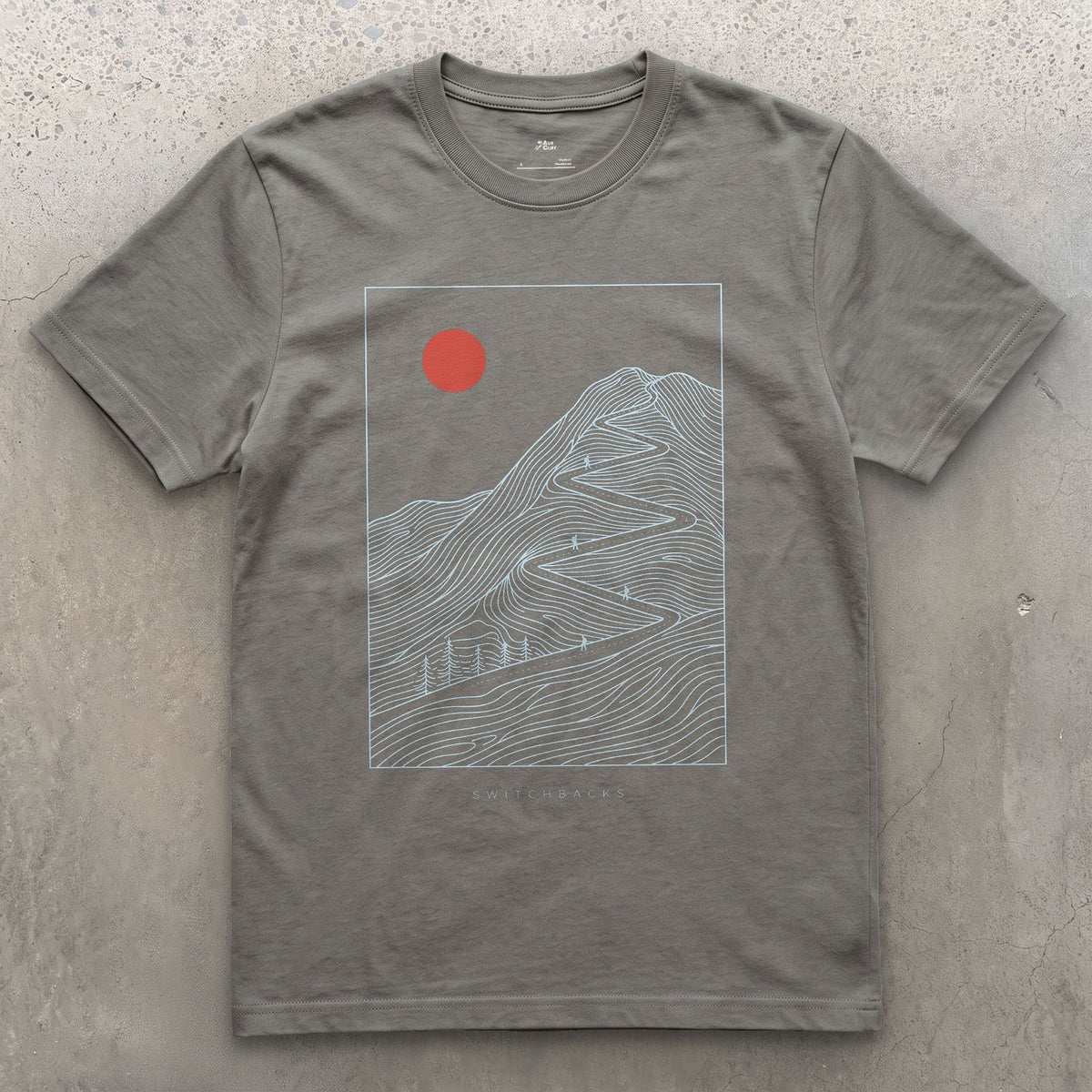 Doubling Back Along the Switchbacks Toward a Red Sun design on a Charcoal Gildan Softstyle t-shirt