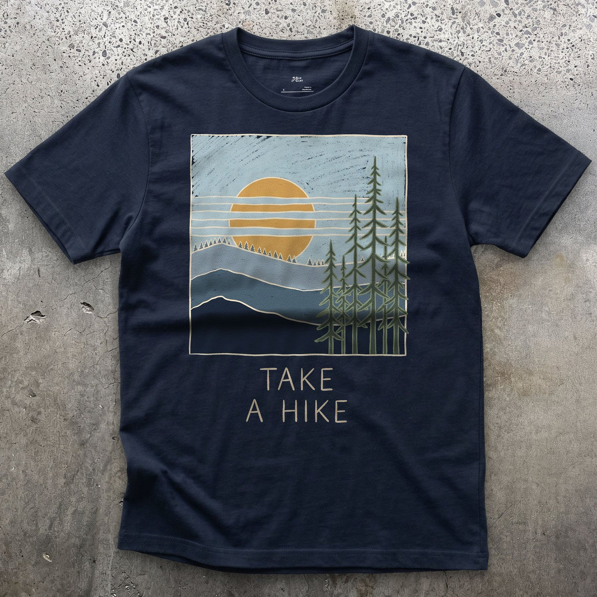 Take a Hike, Sun Over the Ridge design on a Navy Gildan Softstyle t-shirt