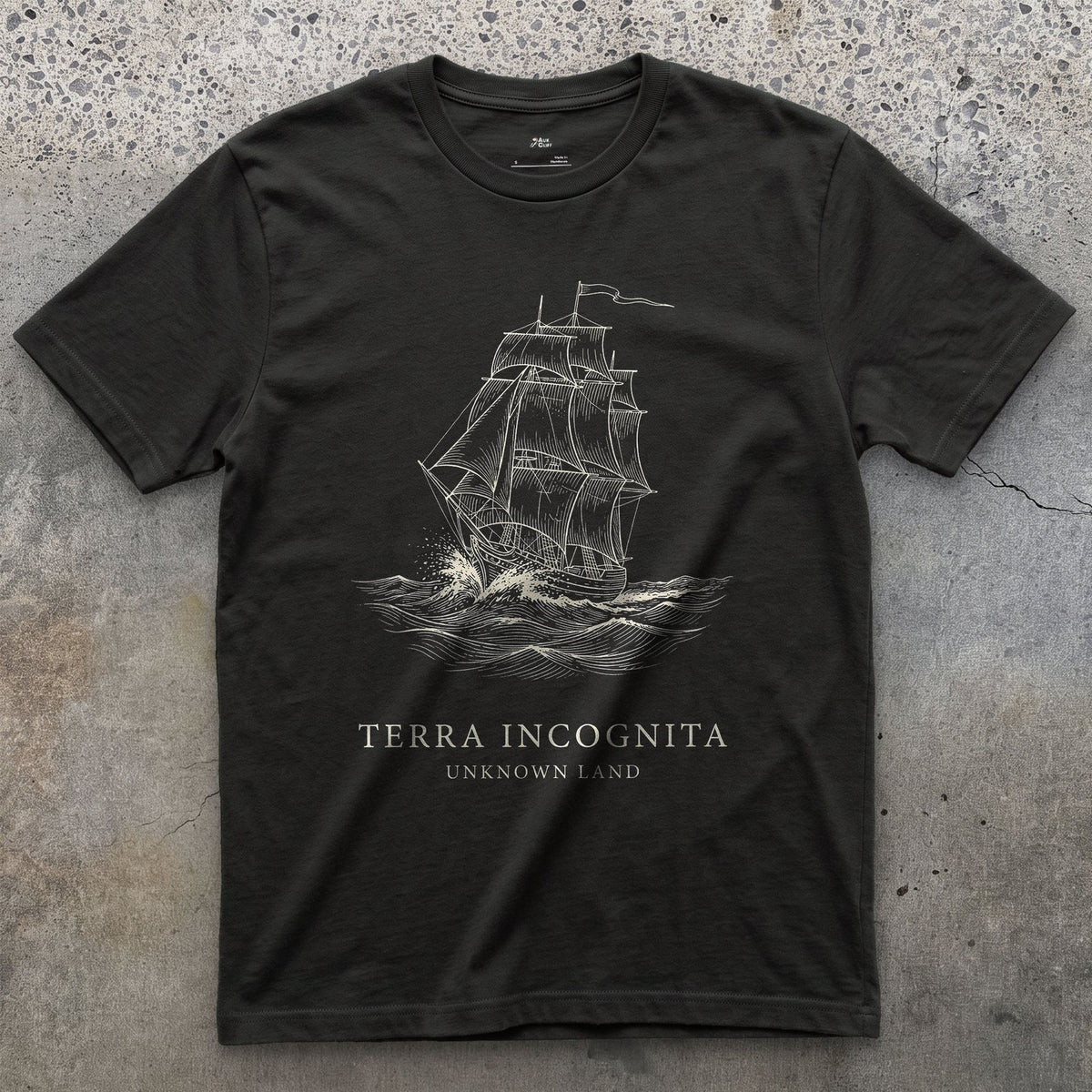 Terra Incognita design on a Black Gildan Softstyle t-shirt