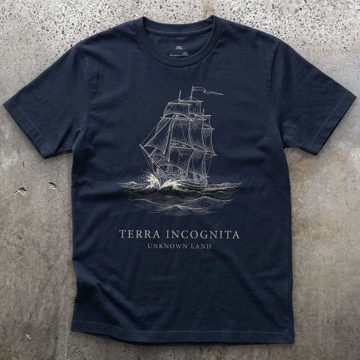 Terra Incognita design on a Navy Gildan Softstyle t-shirt