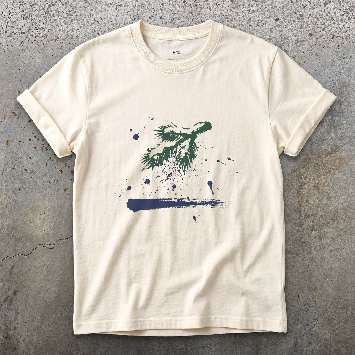 The Branch Drops Its Snow design on a Natural Gildan Softstyle t-shirt