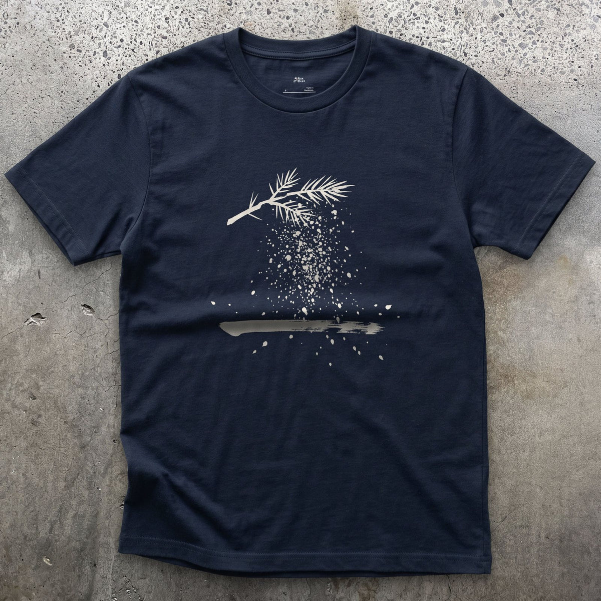 The Branch Drops Its Snow design on a Navy Gildan Softstyle t-shirt