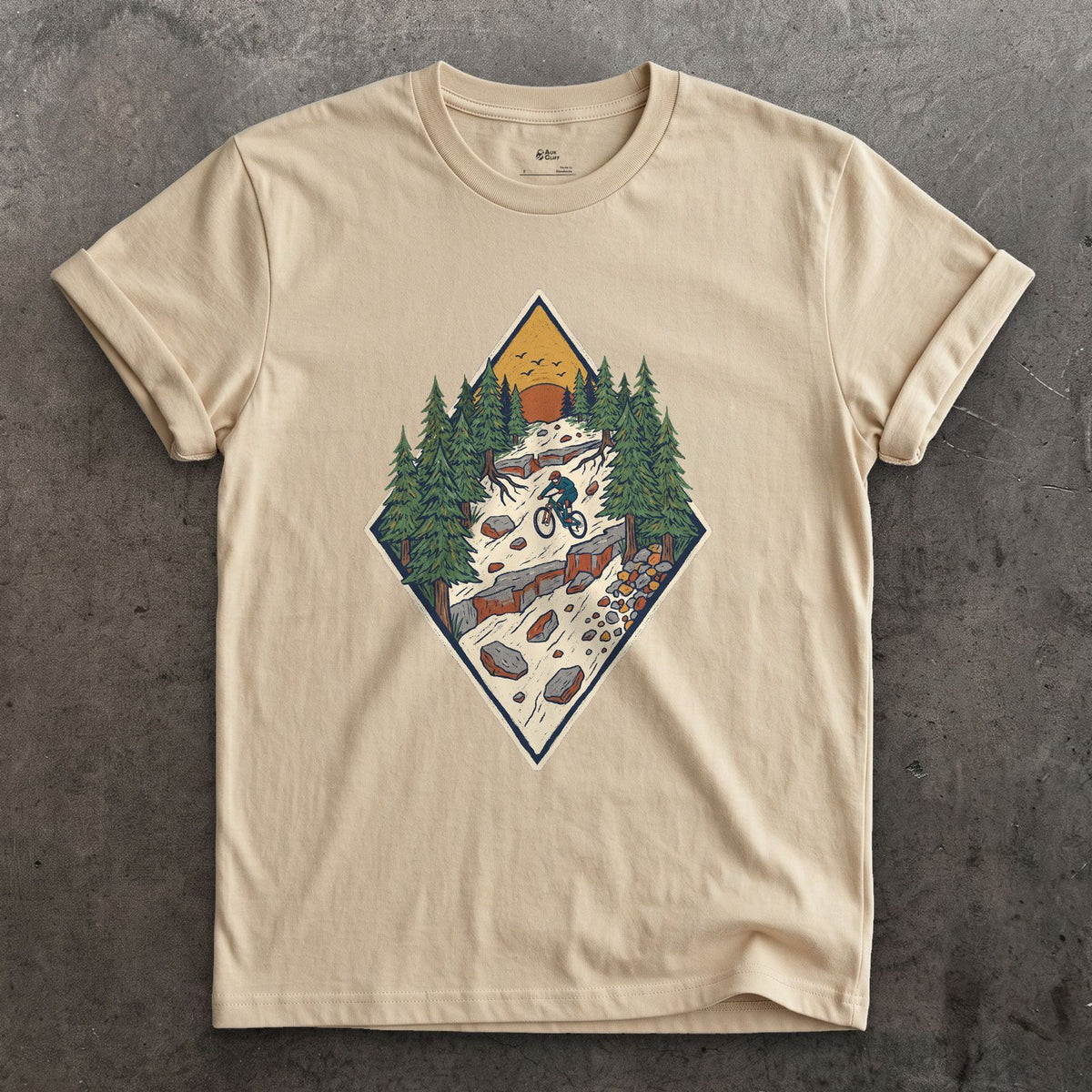 The Chute Behind the Diamond design on a Sand Gildan Softstyle t-shirt