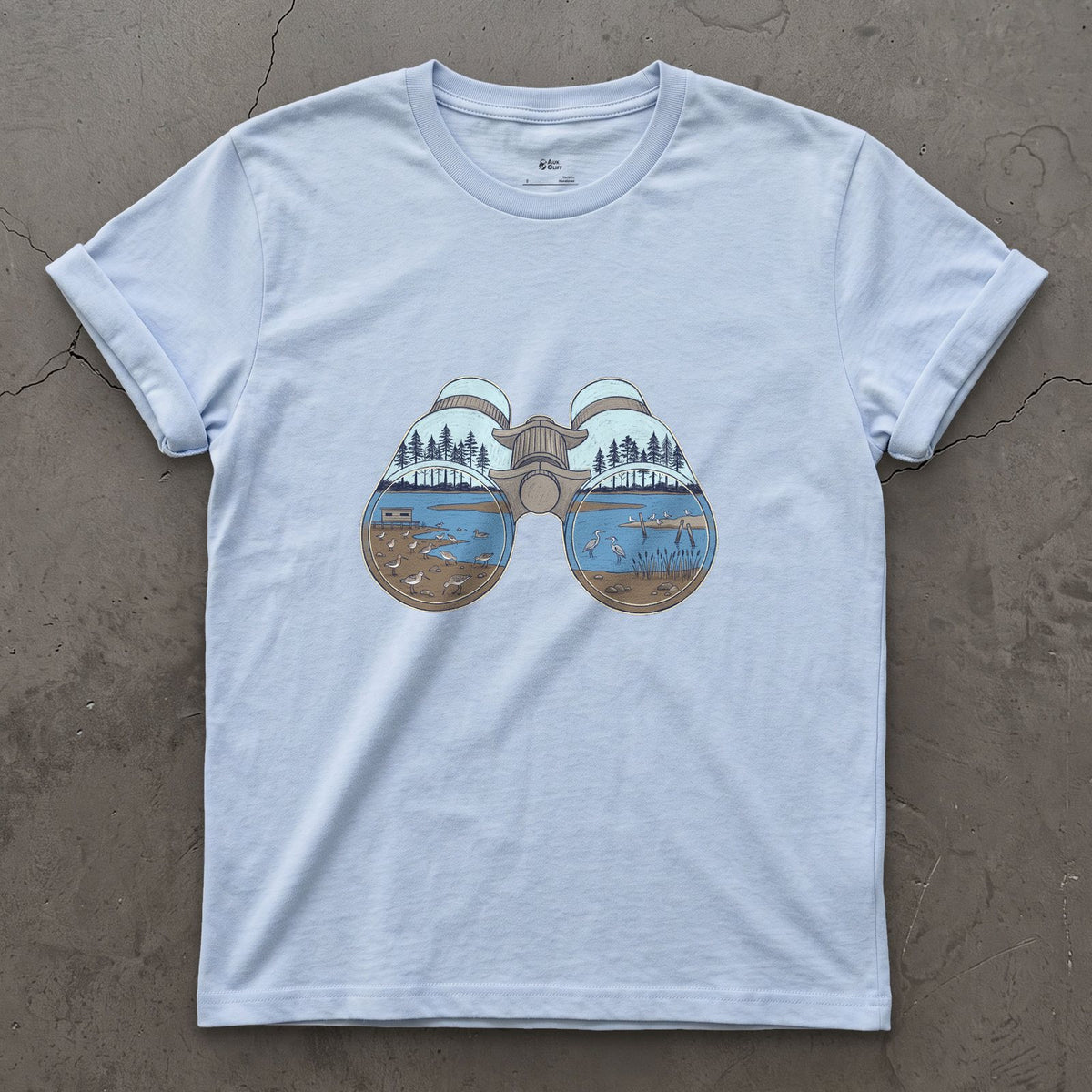 The Estuary in Both Barrels, Binoculars design on a Light Blue Gildan Softstyle t-shirt