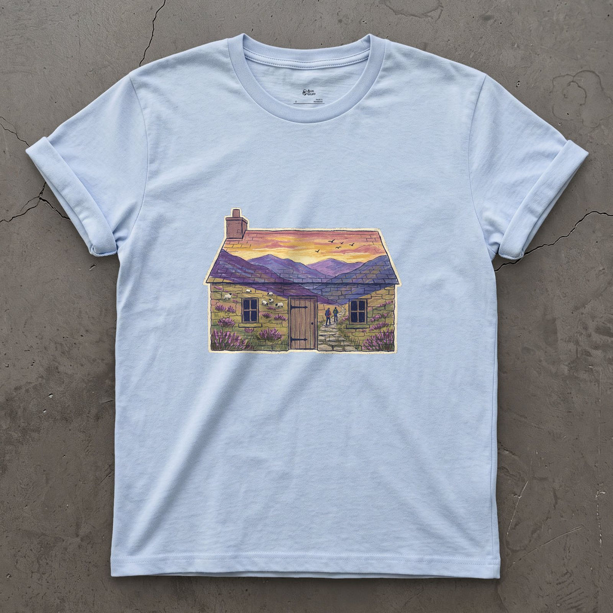 The Glen Outside the Bothy design on a Light Blue Gildan Softstyle t-shirt