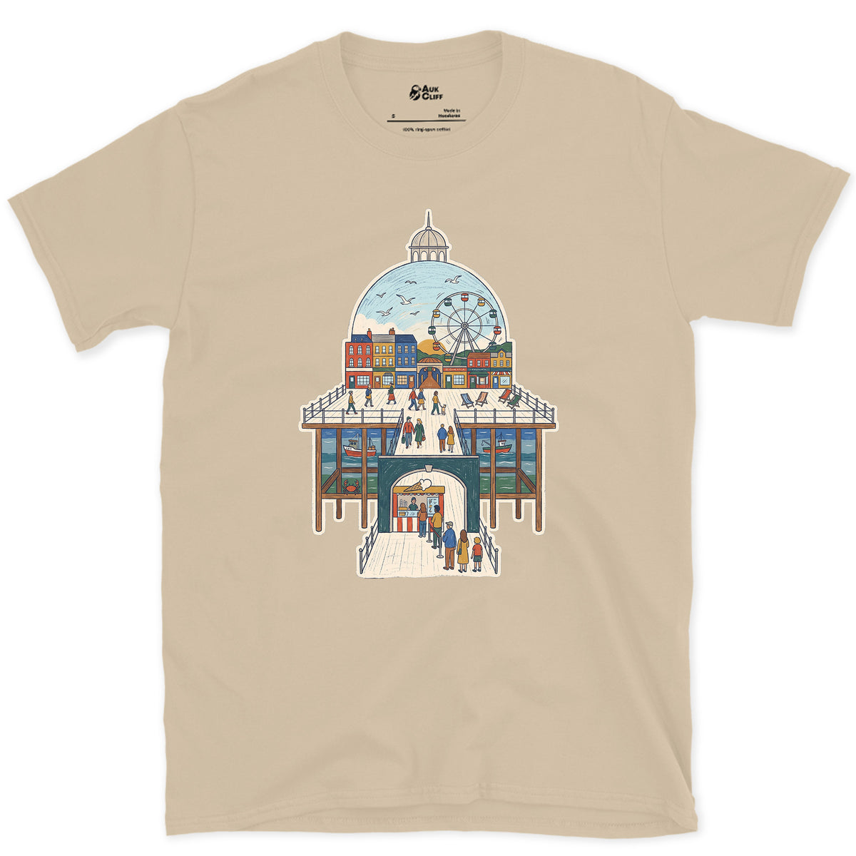 The Town Behind the Pier design on a Sand Gildan Softstyle t-shirt