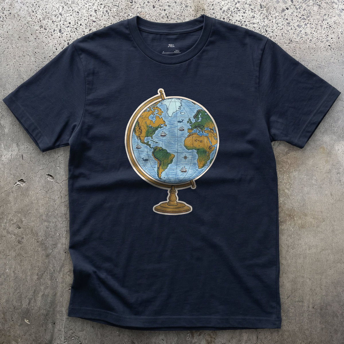 The Whole World on a Stand, Travel Globe design on a Navy Gildan Softstyle t-shirt