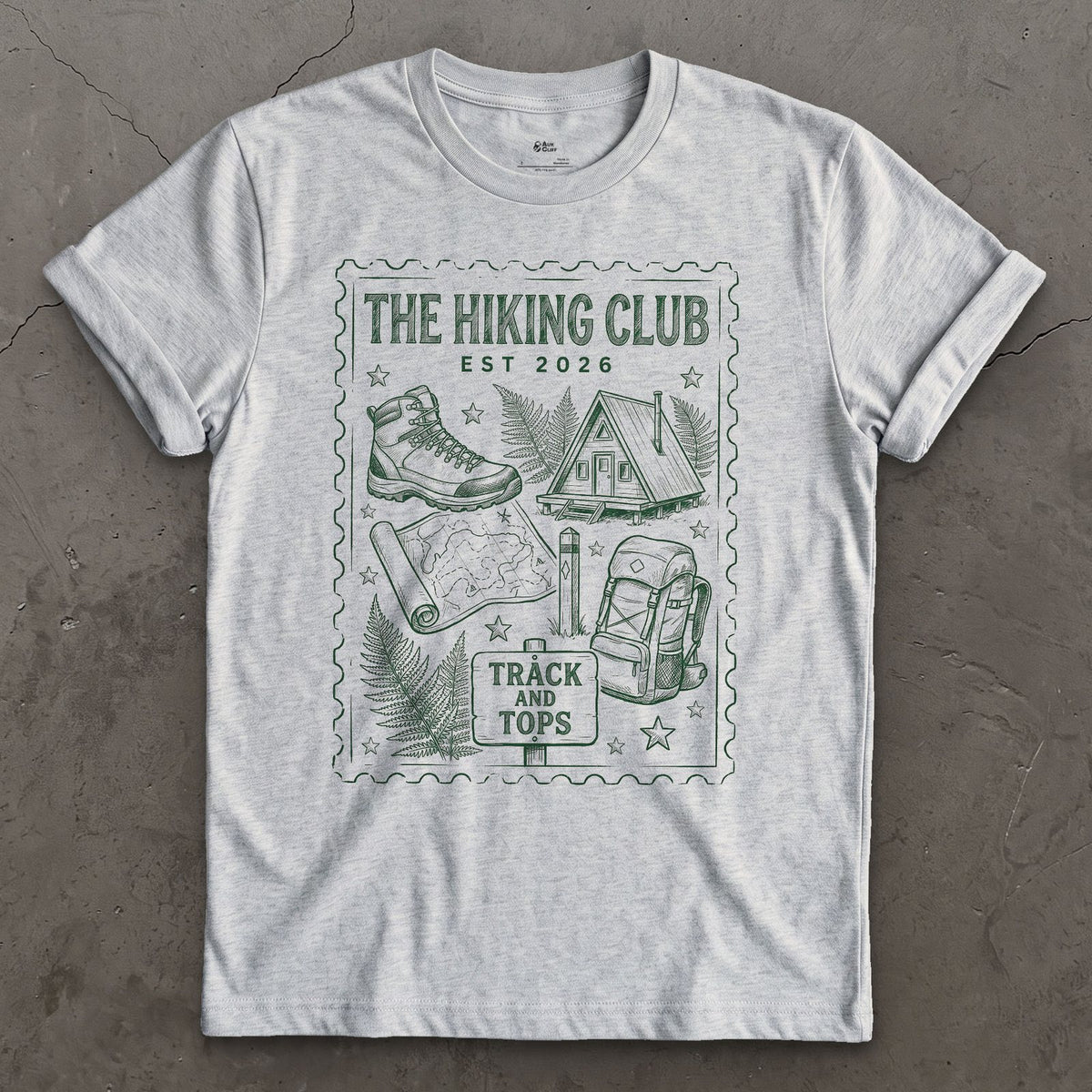 Track and Tops, Boot and Backpack design on a Sport Grey Gildan Softstyle t-shirt