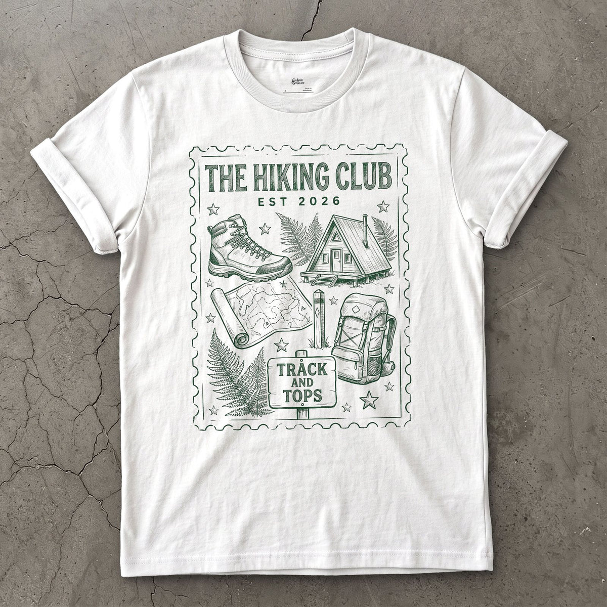 Track and Tops, Boot and Backpack design on a White Gildan Softstyle t-shirt