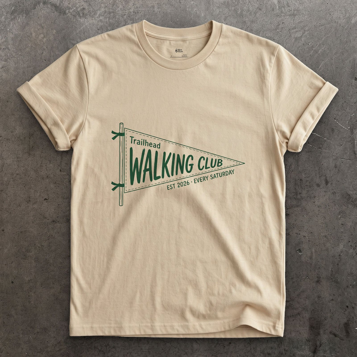 Trailhead Walking Club Meets Every Saturday design on a Sand Gildan Softstyle t-shirt