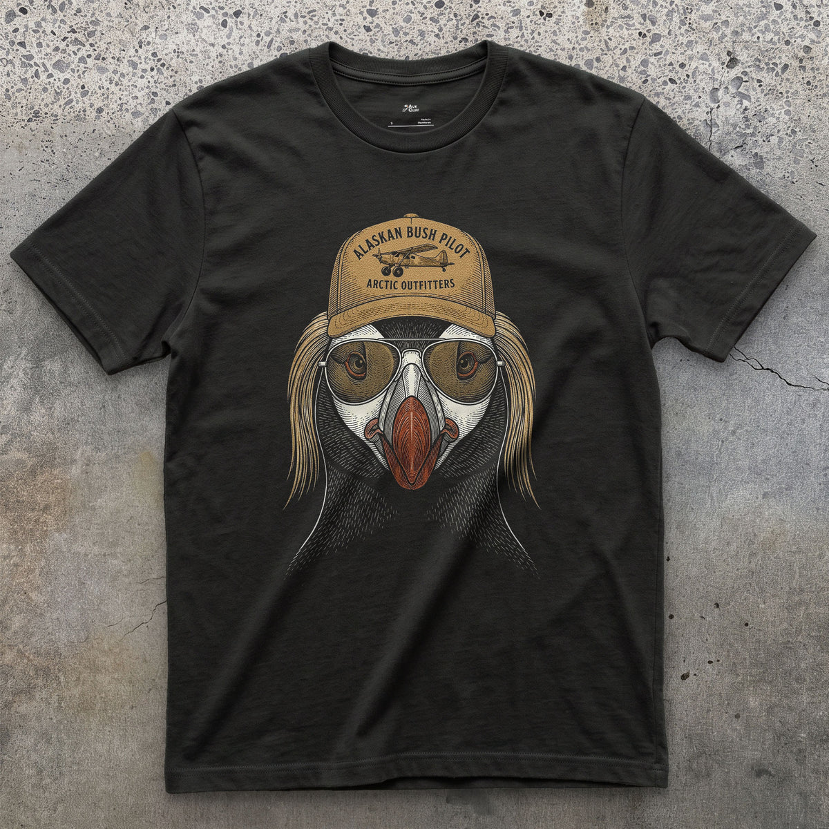 Alaskan Bush Pilot, Tufted Puffin design on a Black Gildan Softstyle t-shirt