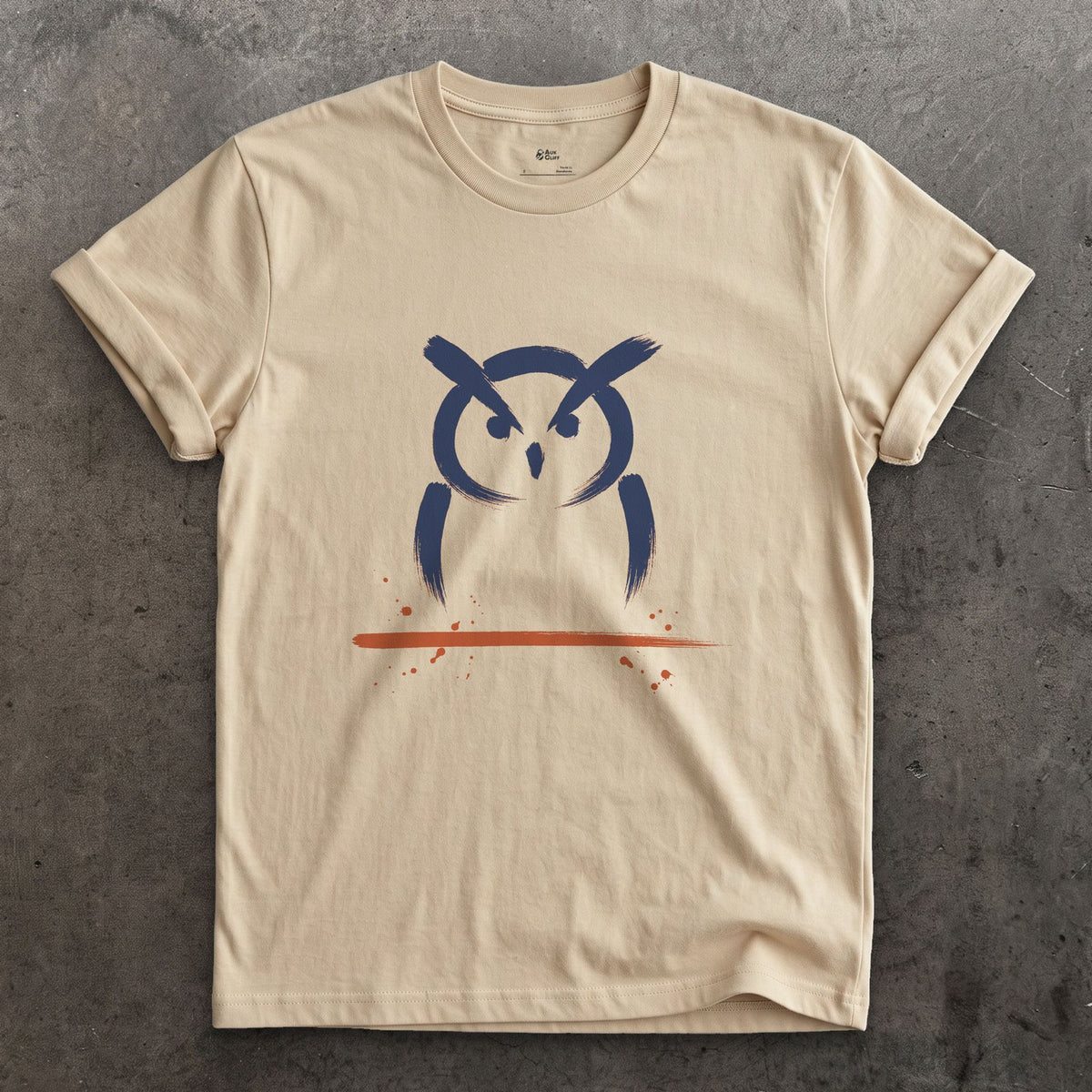 Two Tufts and a Stare design on a Sand Gildan Softstyle t-shirt