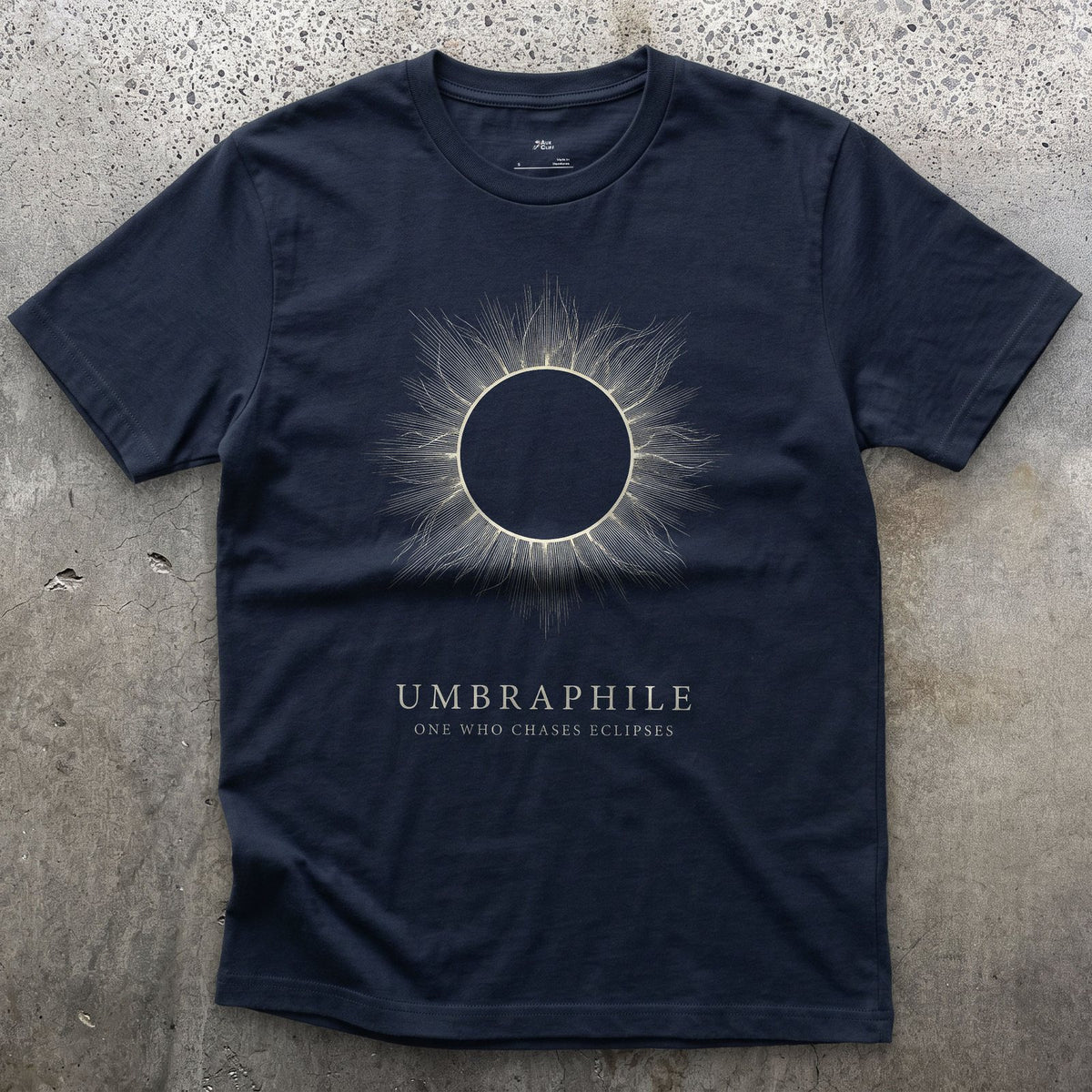 Umbraphile design on a Navy Gildan Softstyle t-shirt