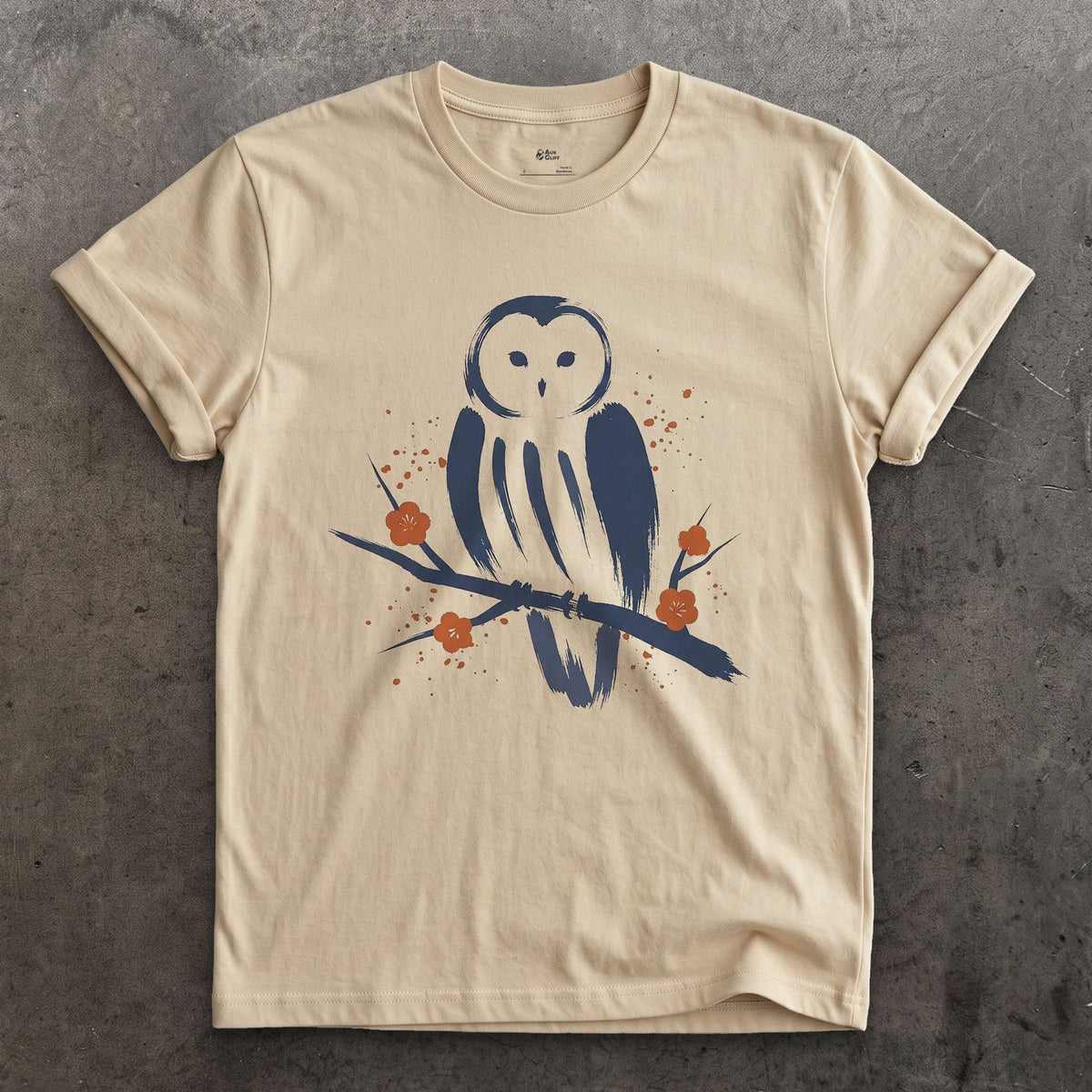 Ural Owl on a Plum Branch design on a Sand Gildan Softstyle t-shirt