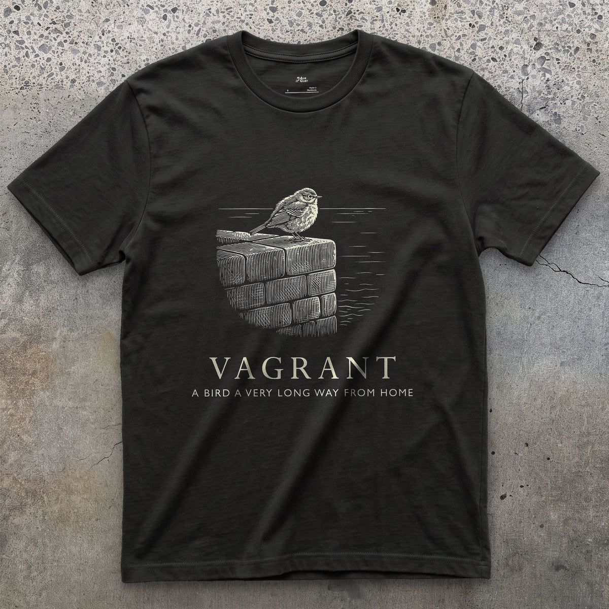 Vagrant, a Bird a Very Long Way From Home design on a Black Gildan Softstyle t-shirt