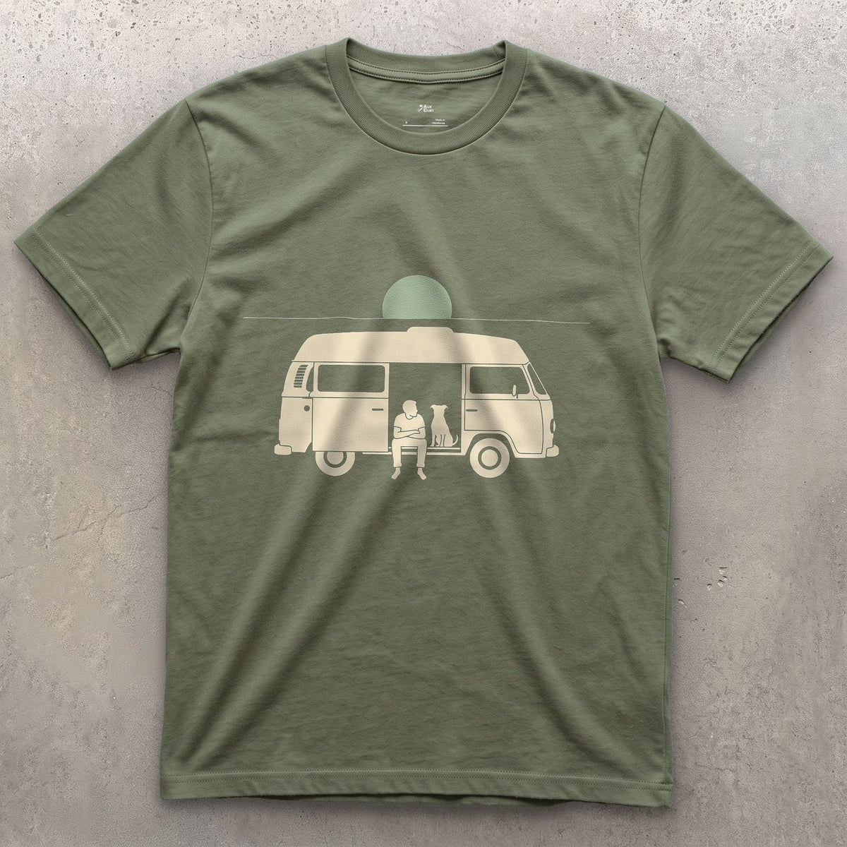 Person, Dog and a Full Moon Through the Camper Door design on a Military Green Gildan Softstyle t-shirt