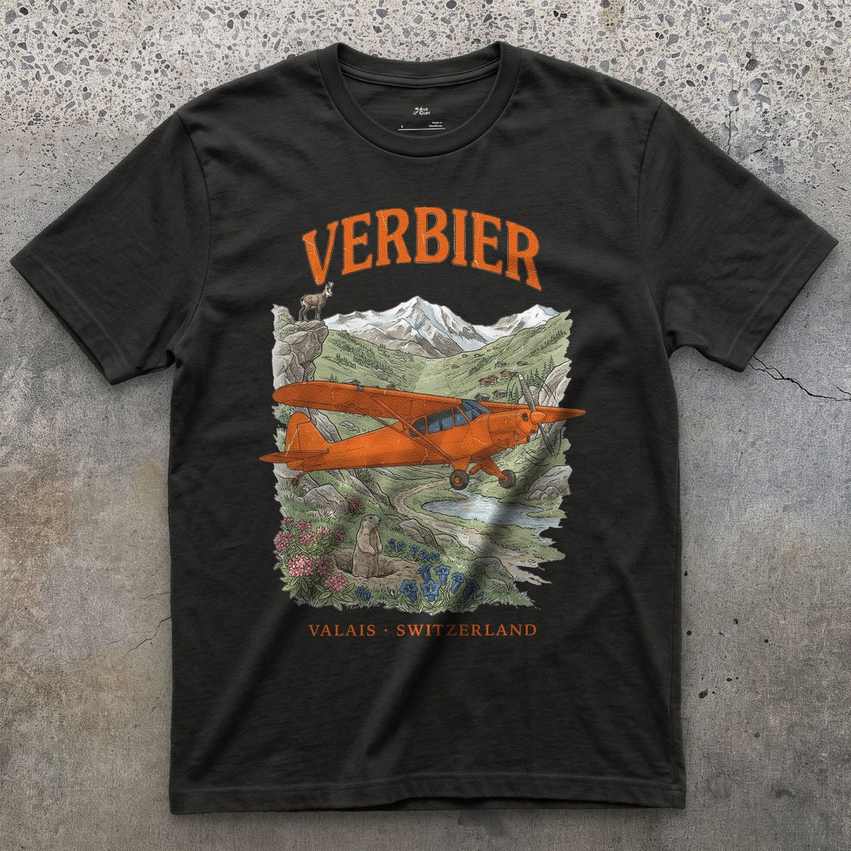 Verbier Bush Plane design on a Black Gildan Softstyle t-shirt