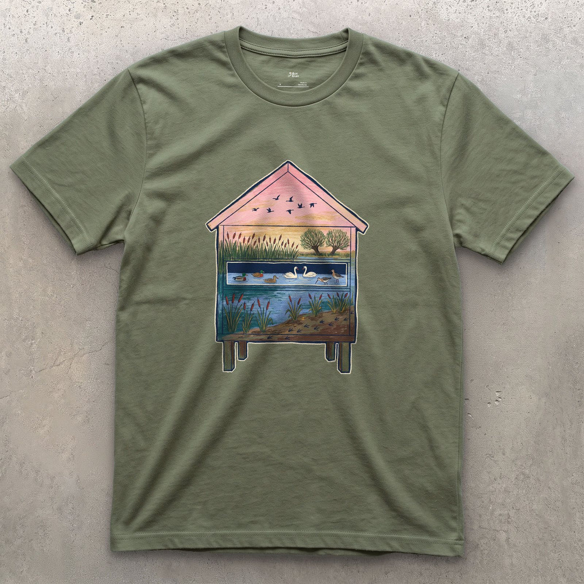 What the Hide Looks Out On design on a Military Green Gildan Softstyle t-shirt