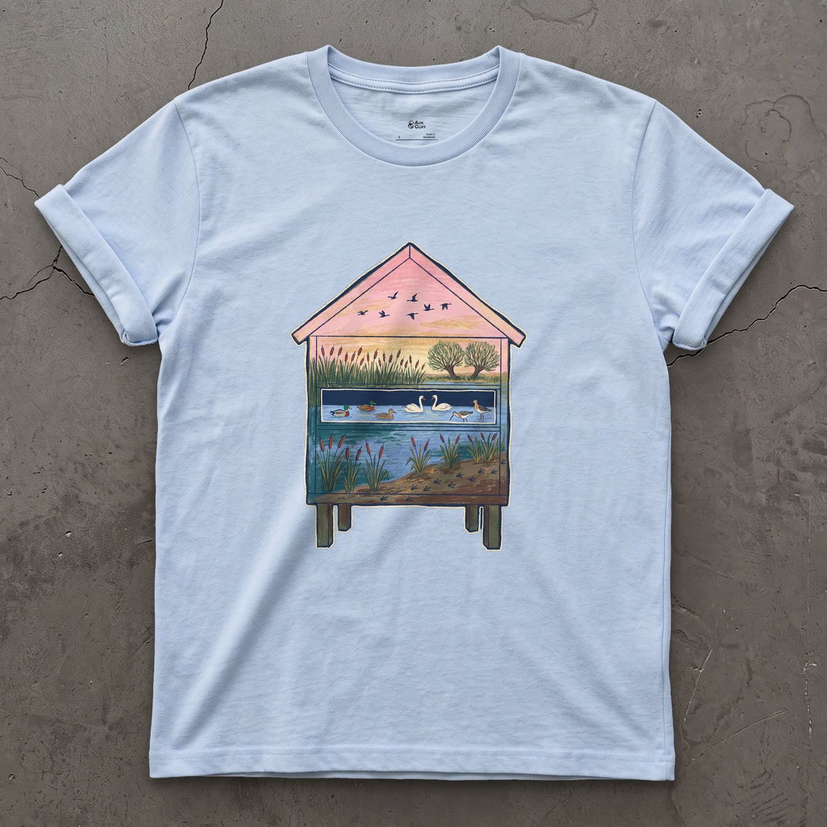 What the Hide Looks Out On design on a Light Blue Gildan Softstyle t-shirt