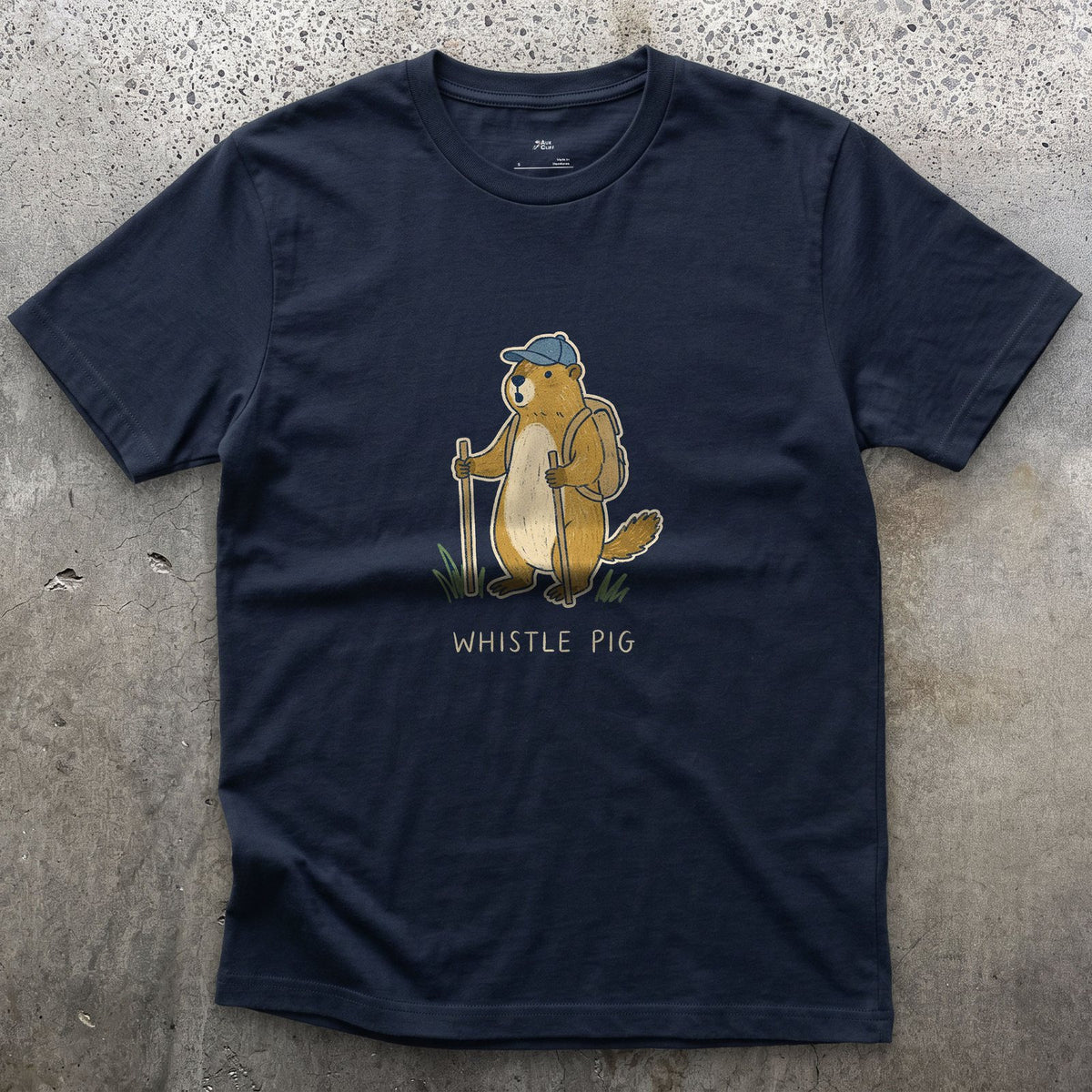 Whistle Pig, Marmot Hiker design on a Navy Gildan Softstyle t-shirt