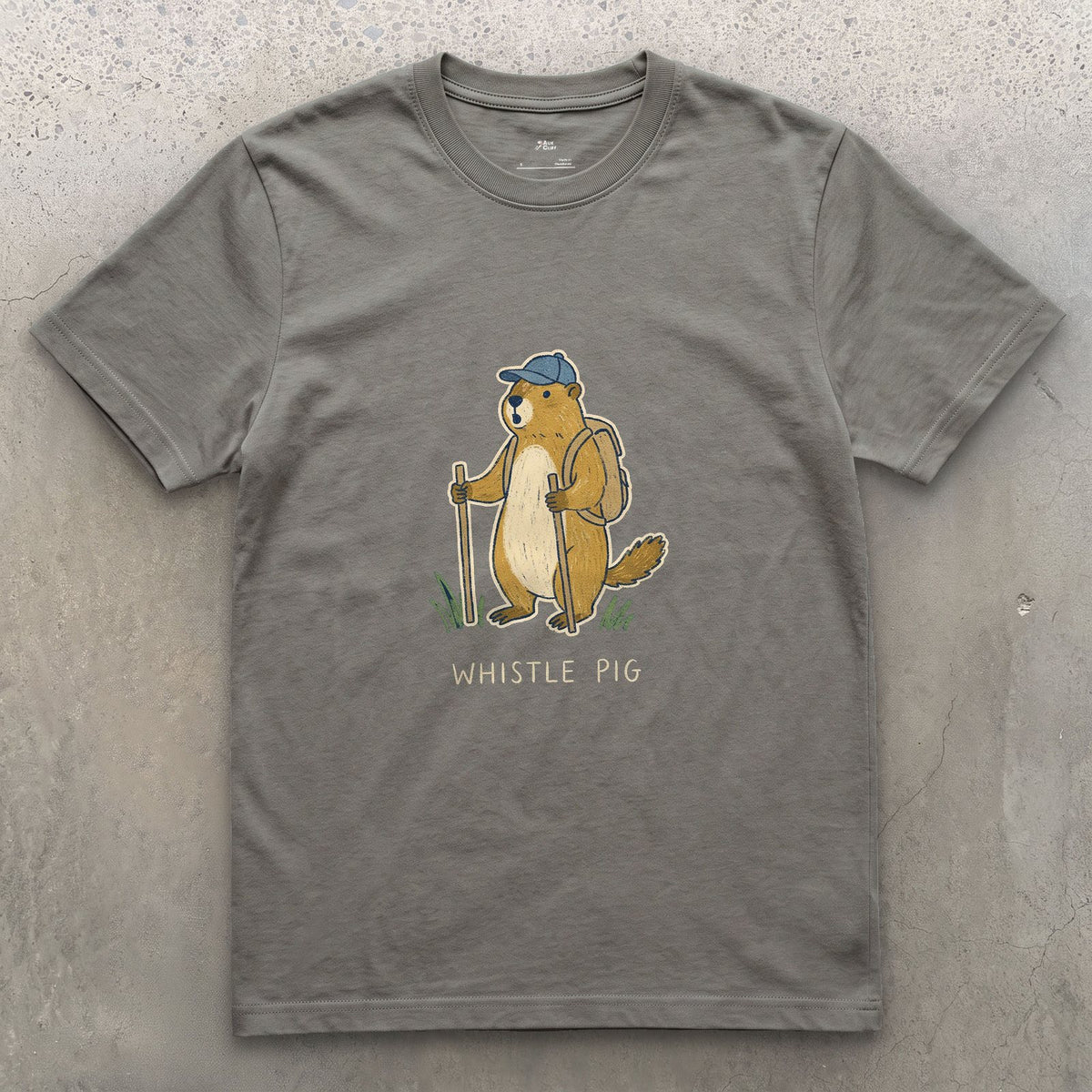 Whistle Pig, Marmot Hiker design on a Charcoal Gildan Softstyle t-shirt