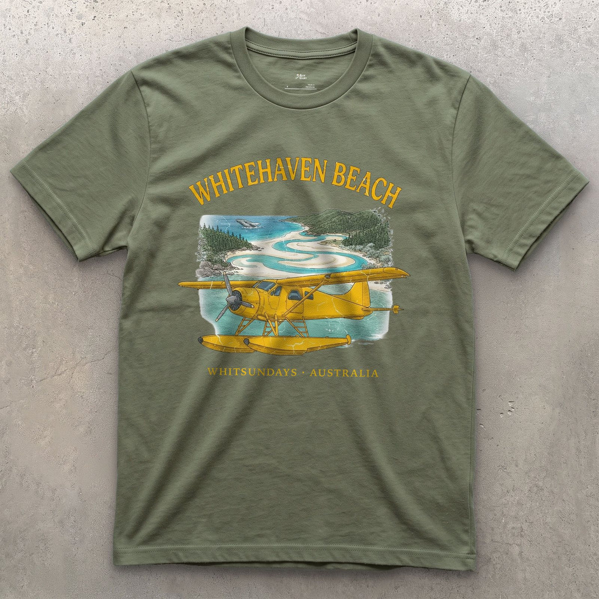Whitehaven Beach Bush Plane design on a Military Green Gildan Softstyle t-shirt