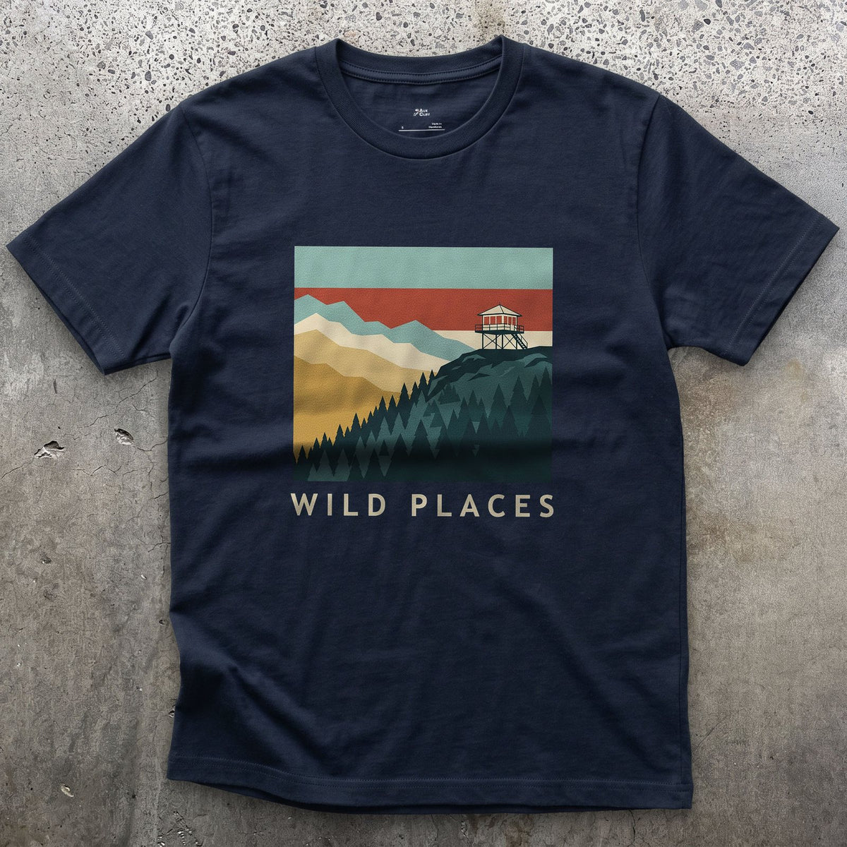Wild Places, Fire Lookout on the Ridge design on a Navy Gildan Softstyle t-shirt