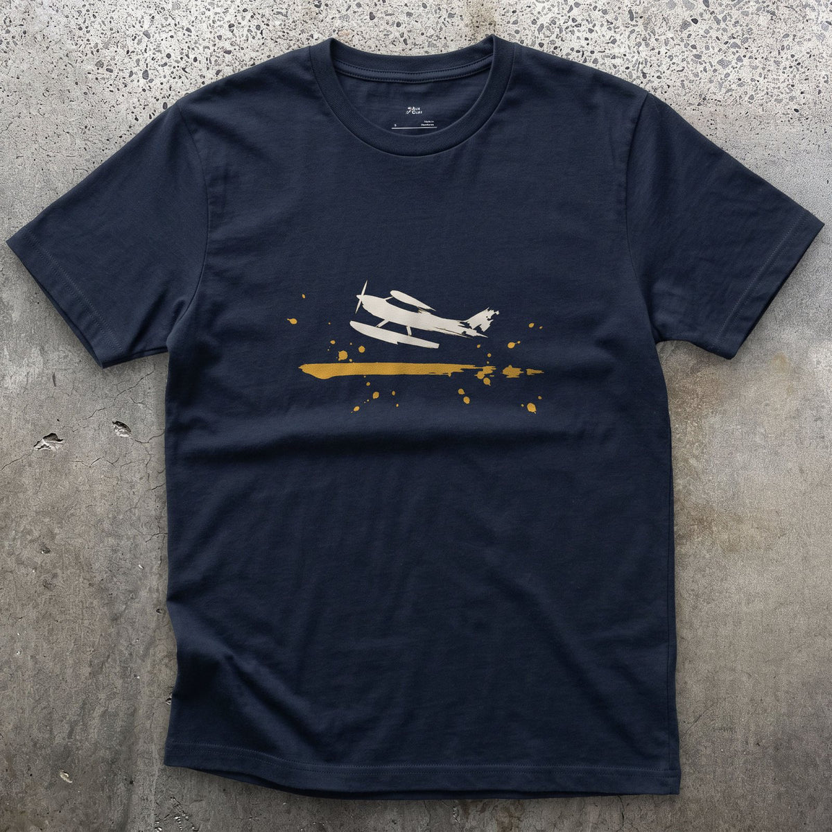 Wings, Floats, Nothing Else design on a Navy Gildan Softstyle t-shirt