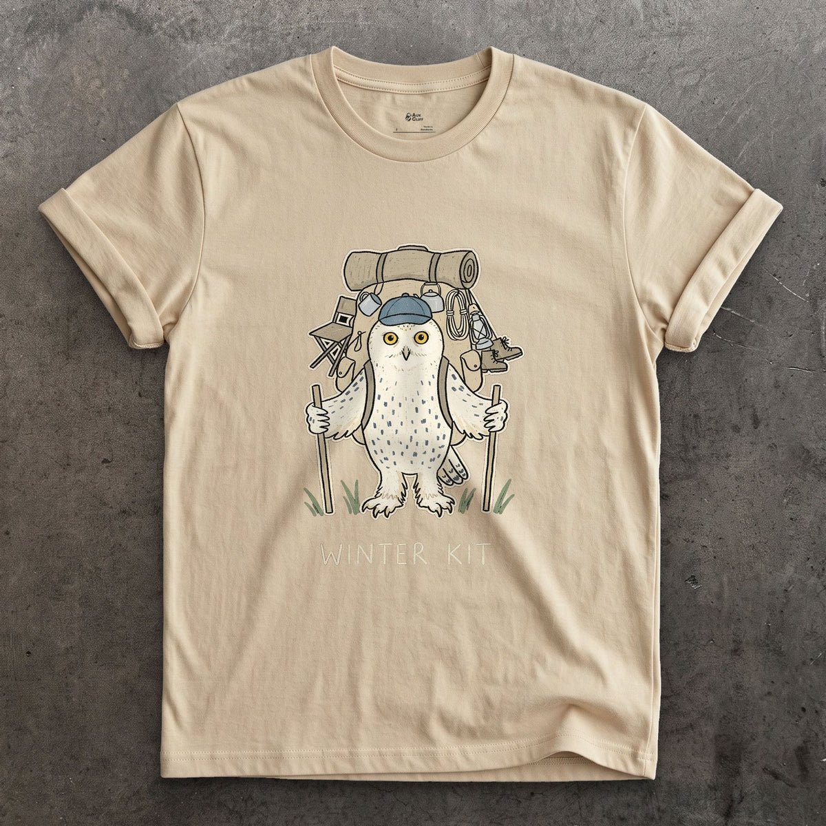 Winter Kit, Snowy Owl Hiker design on a Sand Gildan Softstyle t-shirt