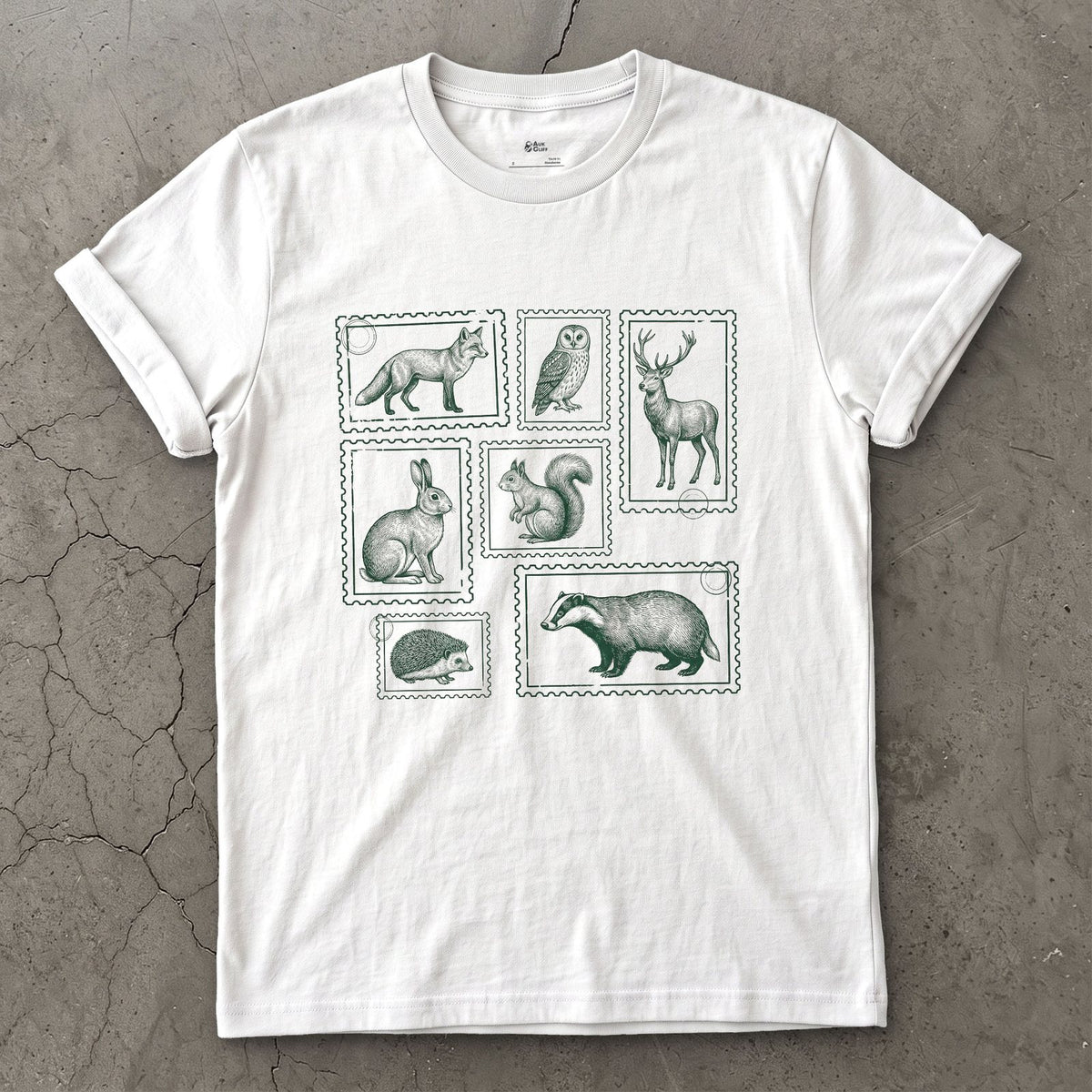 The Whole Woodland Framed Like Stamps design on a White Gildan Softstyle t-shirt