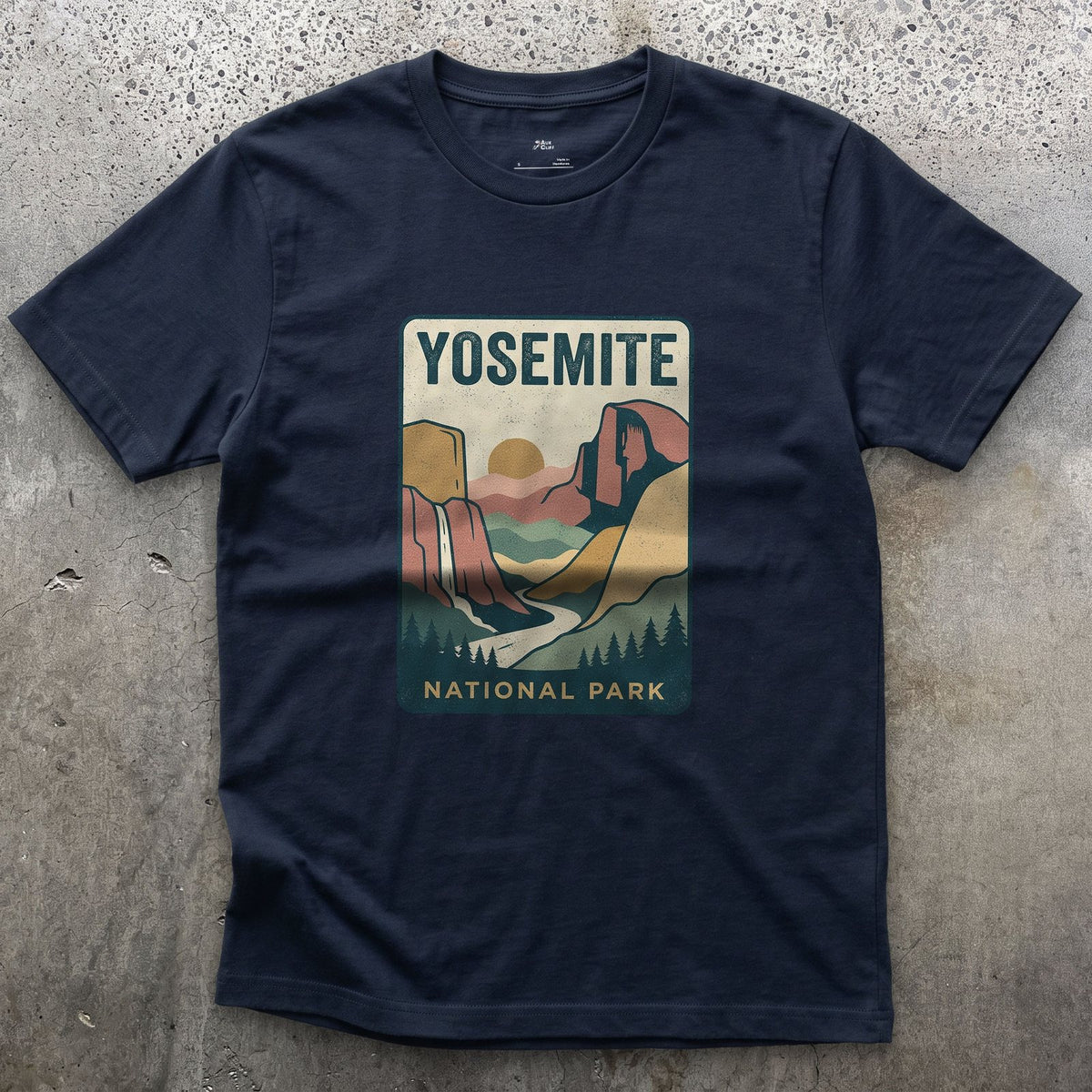 Yosemite Waterfall Past the Cliff design on a Navy Gildan Softstyle t-shirt