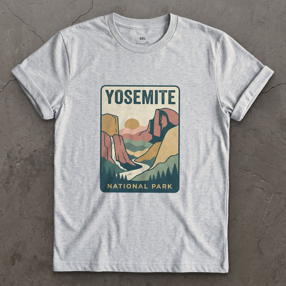 Yosemite Waterfall Past the Cliff design on a Sport Grey Gildan Softstyle t-shirt