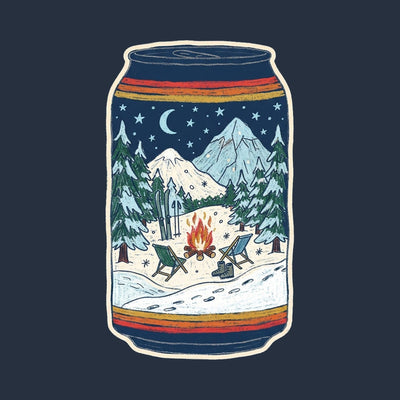 A drinks can holding a night scene of a campfire and camp chairs between snowy peaks and pines, printed on a navy cotton tee
