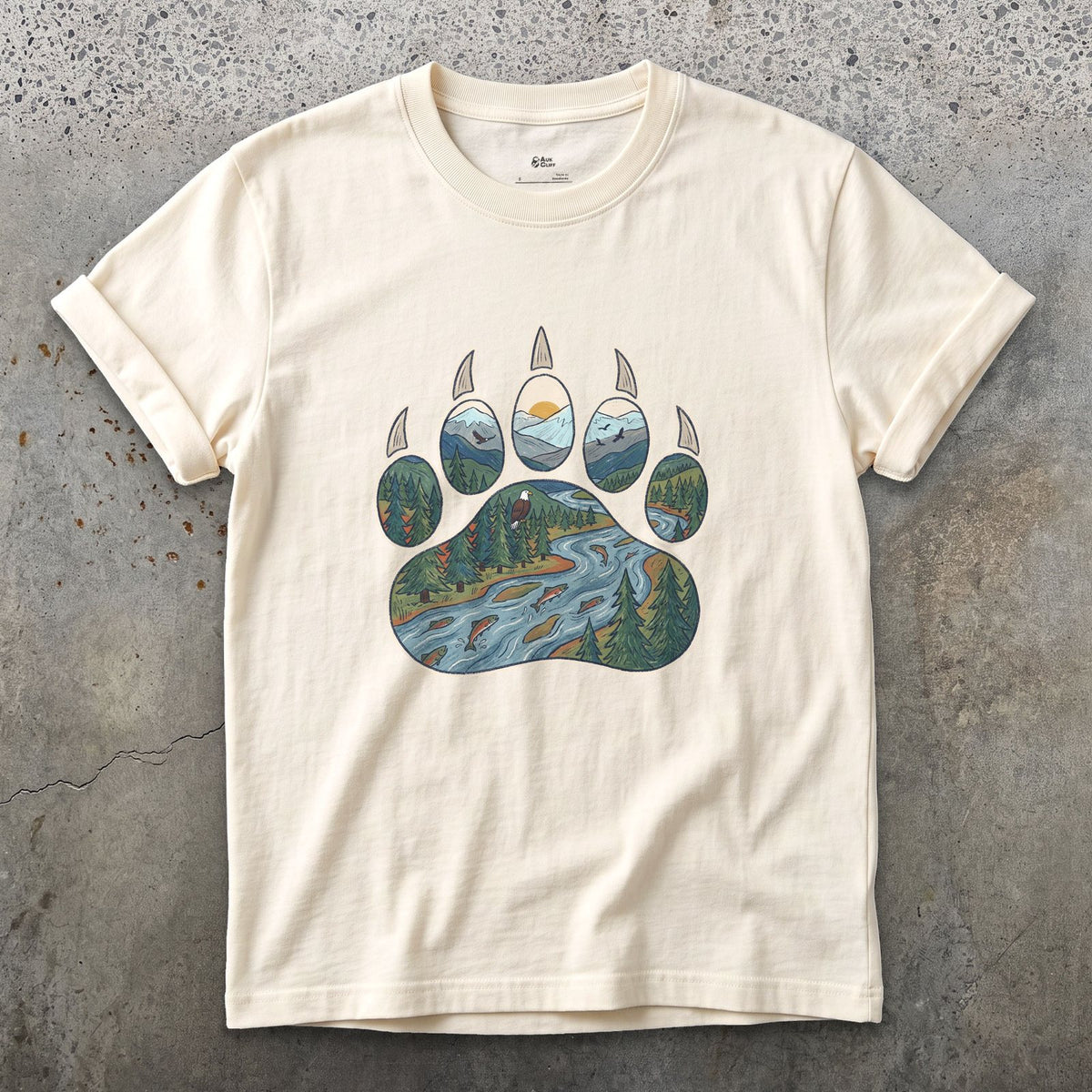 A Salmon River in the Paw Print design on a Natural Gildan Softstyle t-shirt