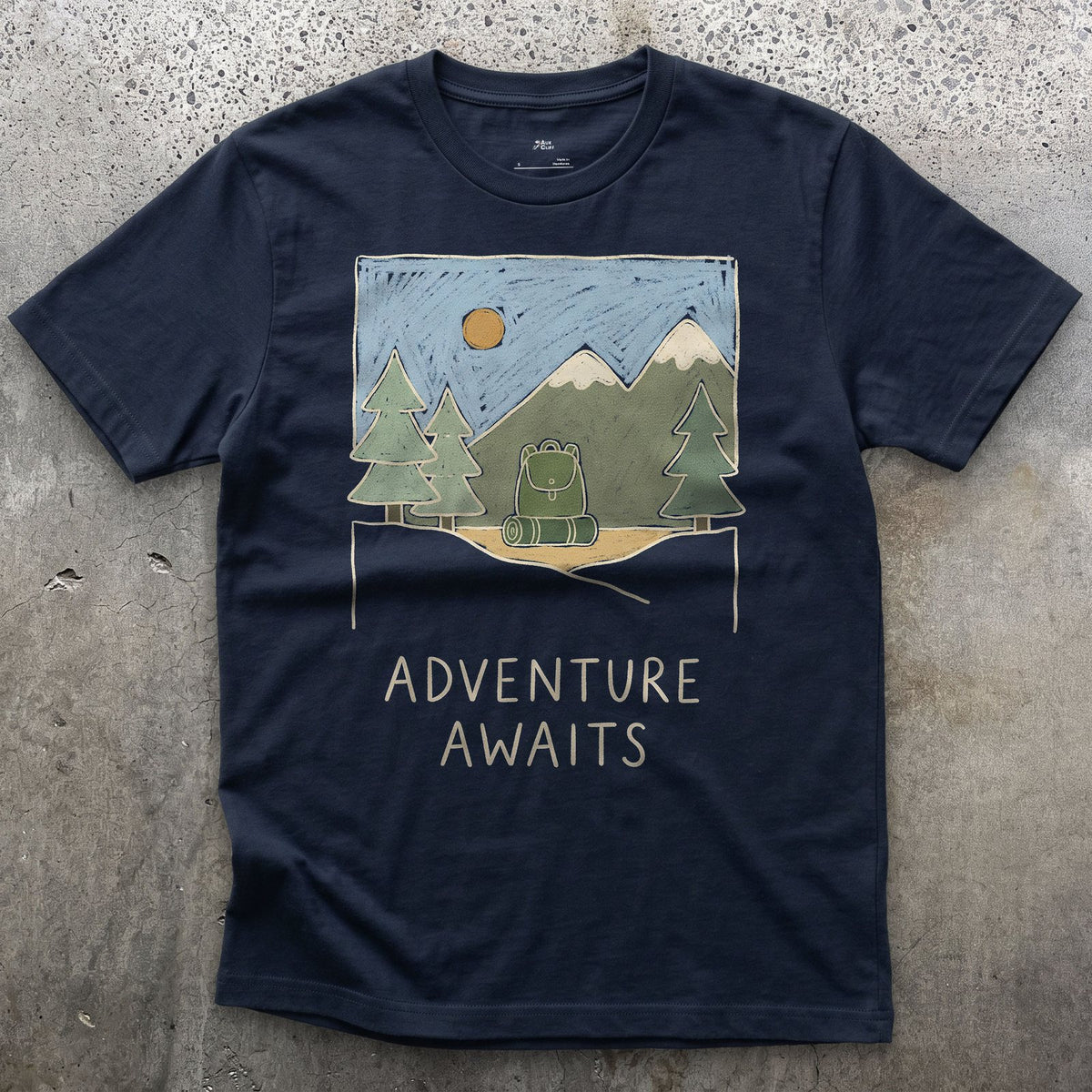 Adventure Awaits design on a Navy Gildan Softstyle t-shirt