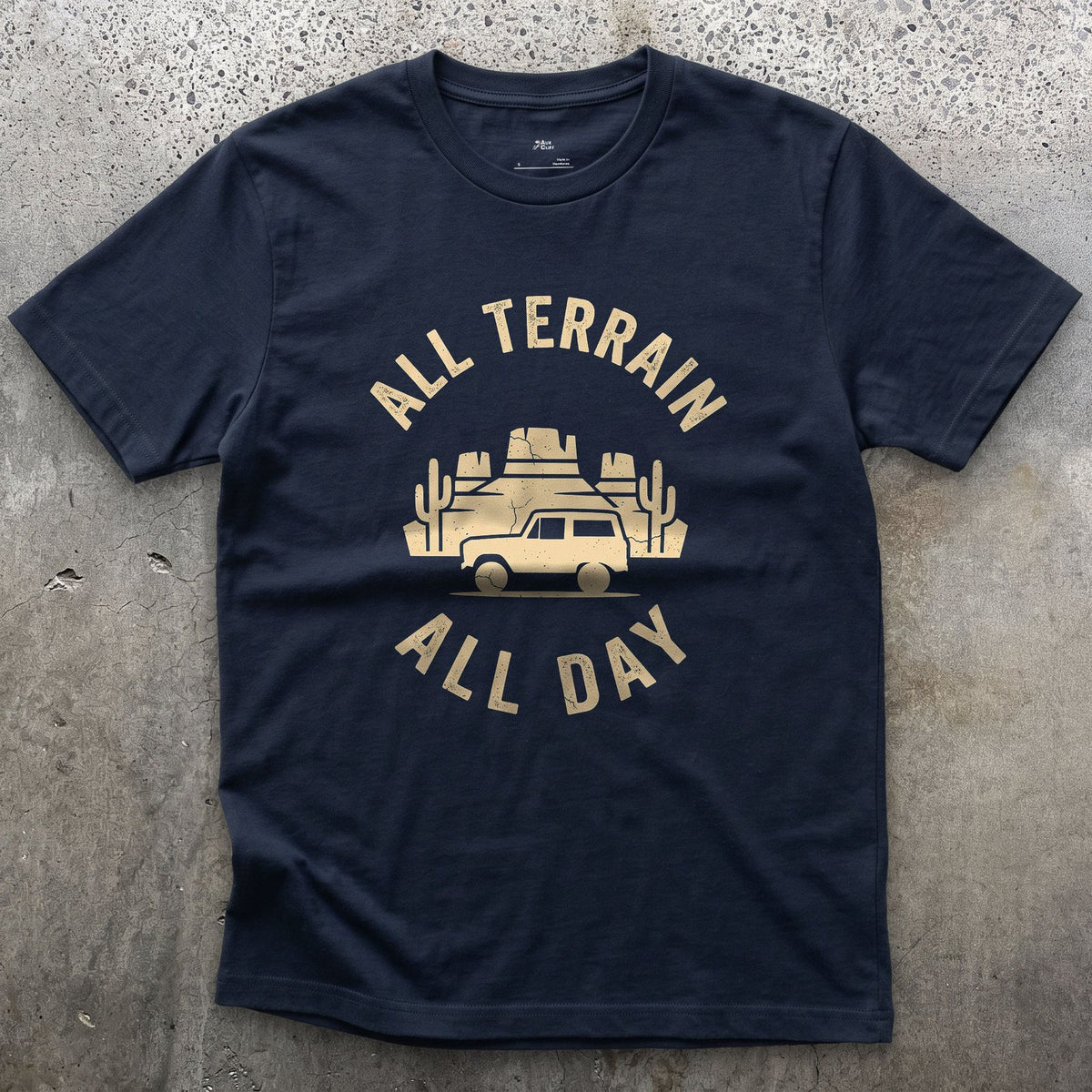 All Terrain All Day, Wagon Among the Mesas design on a Navy Gildan Softstyle t-shirt