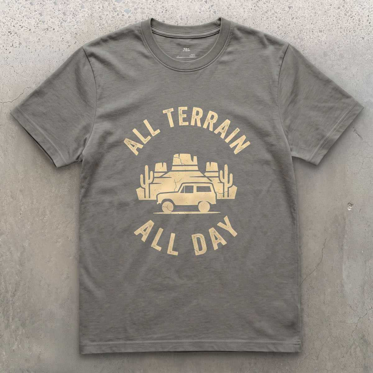 All Terrain All Day, Wagon Among the Mesas design on a Charcoal Gildan Softstyle t-shirt