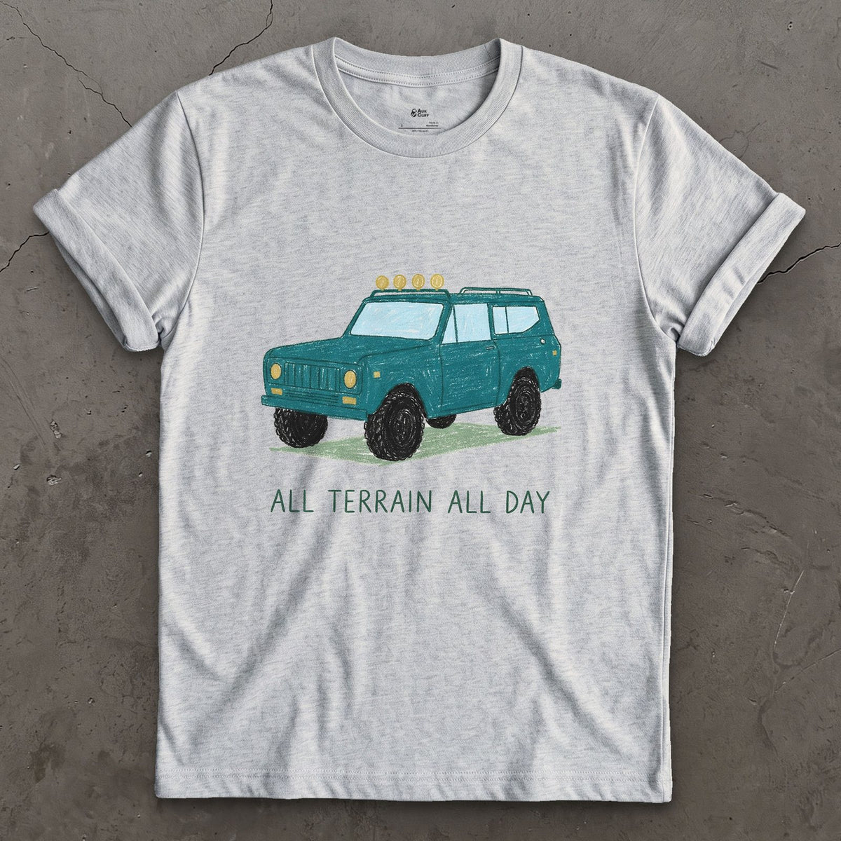 All Terrain All Day, Teal Wagon design on a Sport Grey Gildan Softstyle t-shirt