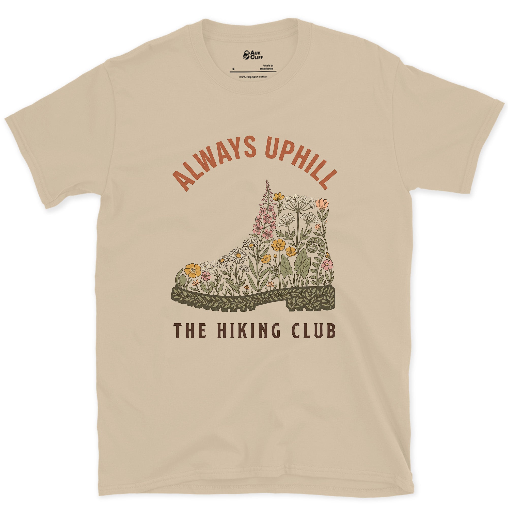 Always Uphill, Boot Full of Wildflowers design on a Sand Gildan Softstyle t-shirt