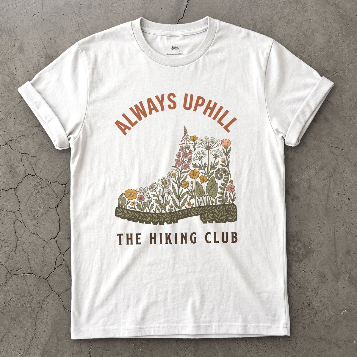 Always Uphill, Boot Full of Wildflowers design on a White Gildan Softstyle t-shirt