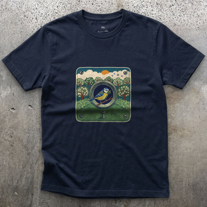 An Orchard Through a Nest Box Hole design on a Navy Gildan Softstyle t-shirt