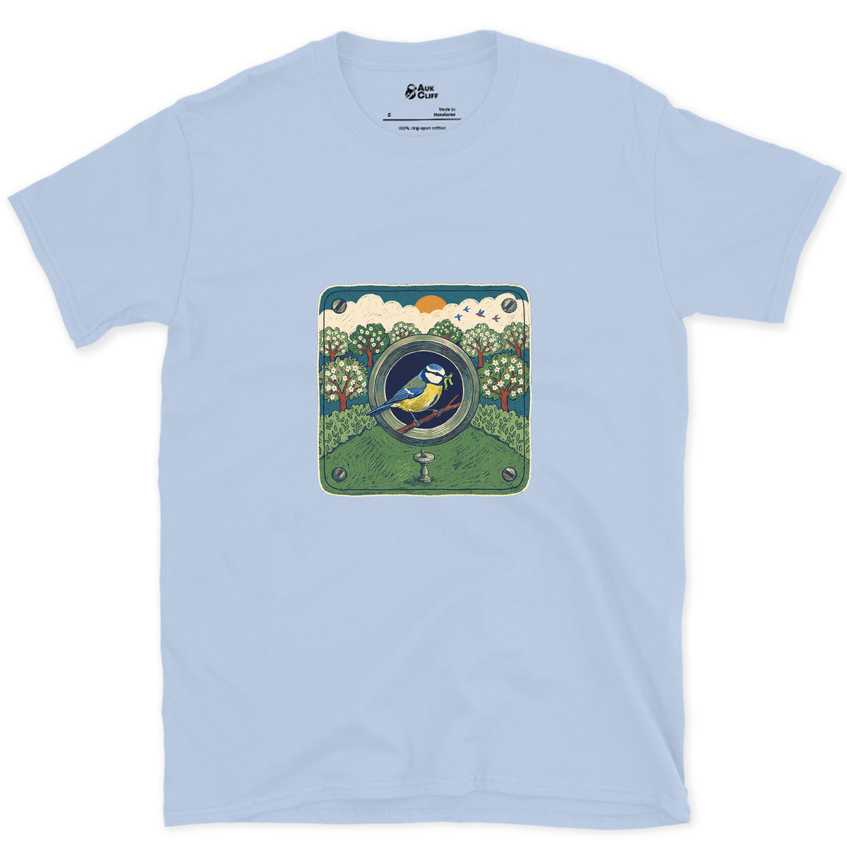 An Orchard Through a Nest Box Hole design on a Light Blue Gildan Softstyle t-shirt