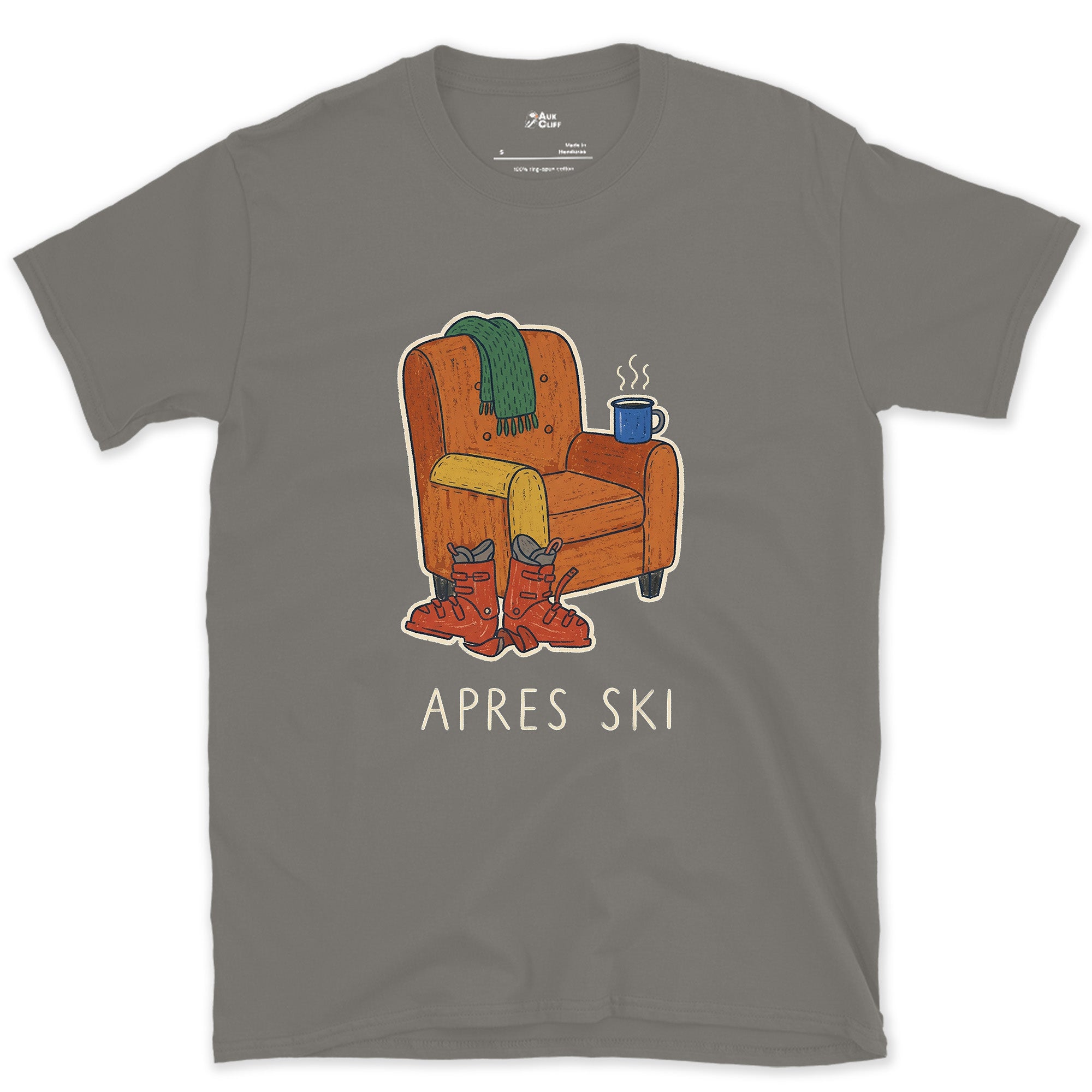 Apres Ski, Armchair With Boots and a Mug design on a Charcoal Gildan Softstyle t-shirt
