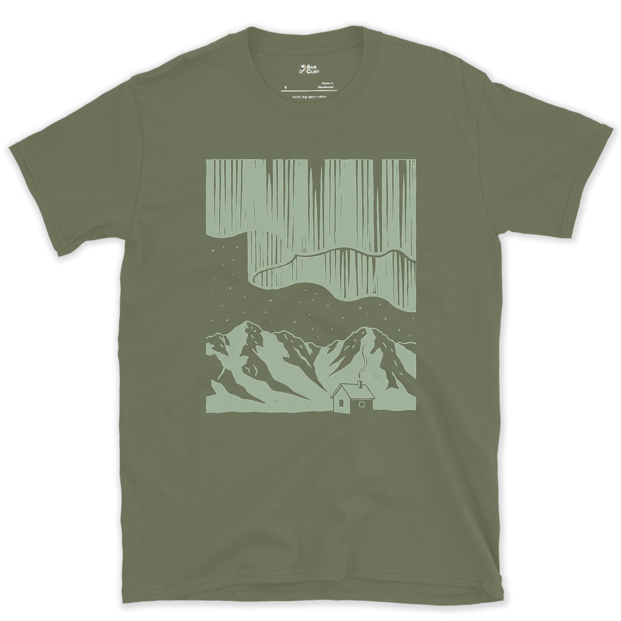 Stars Stacked Above a Small Cabin, Dark design on a Military Green Gildan Softstyle t-shirt