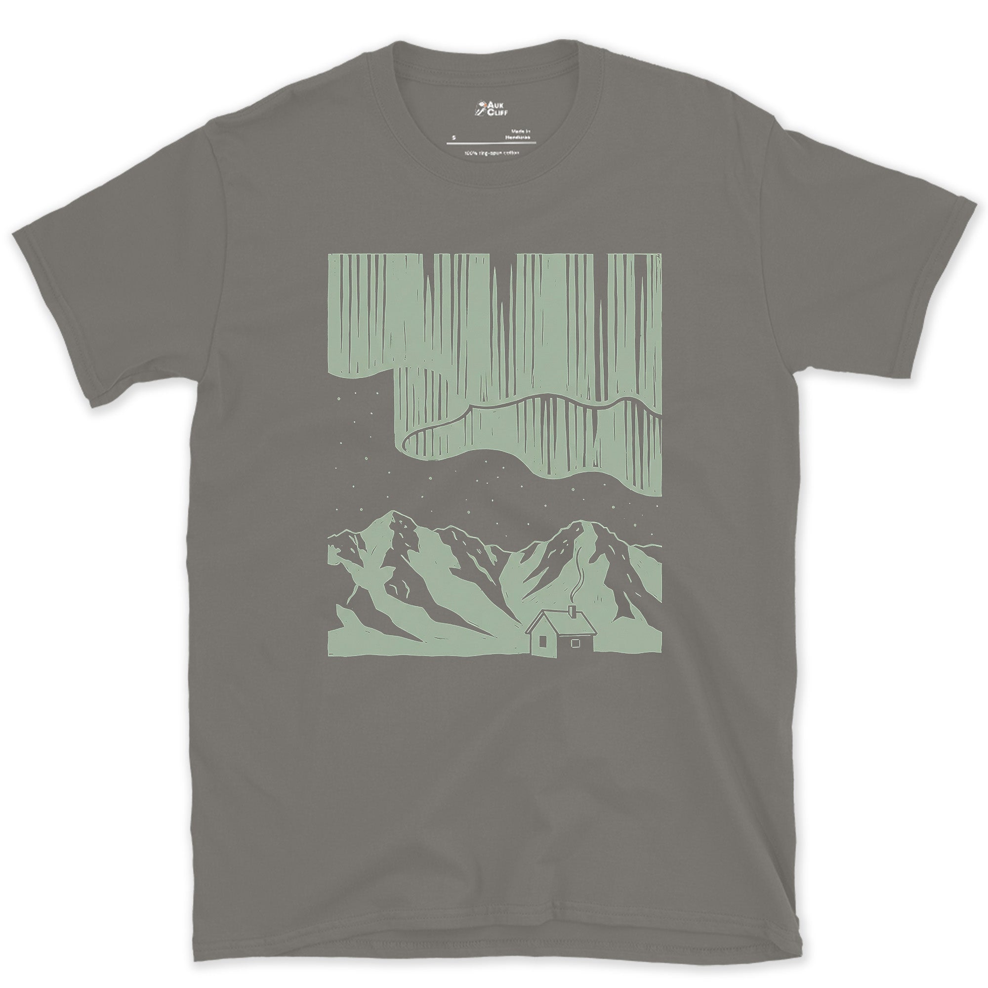 Stars Stacked Above a Small Cabin, Dark design on a Charcoal Gildan Softstyle t-shirt