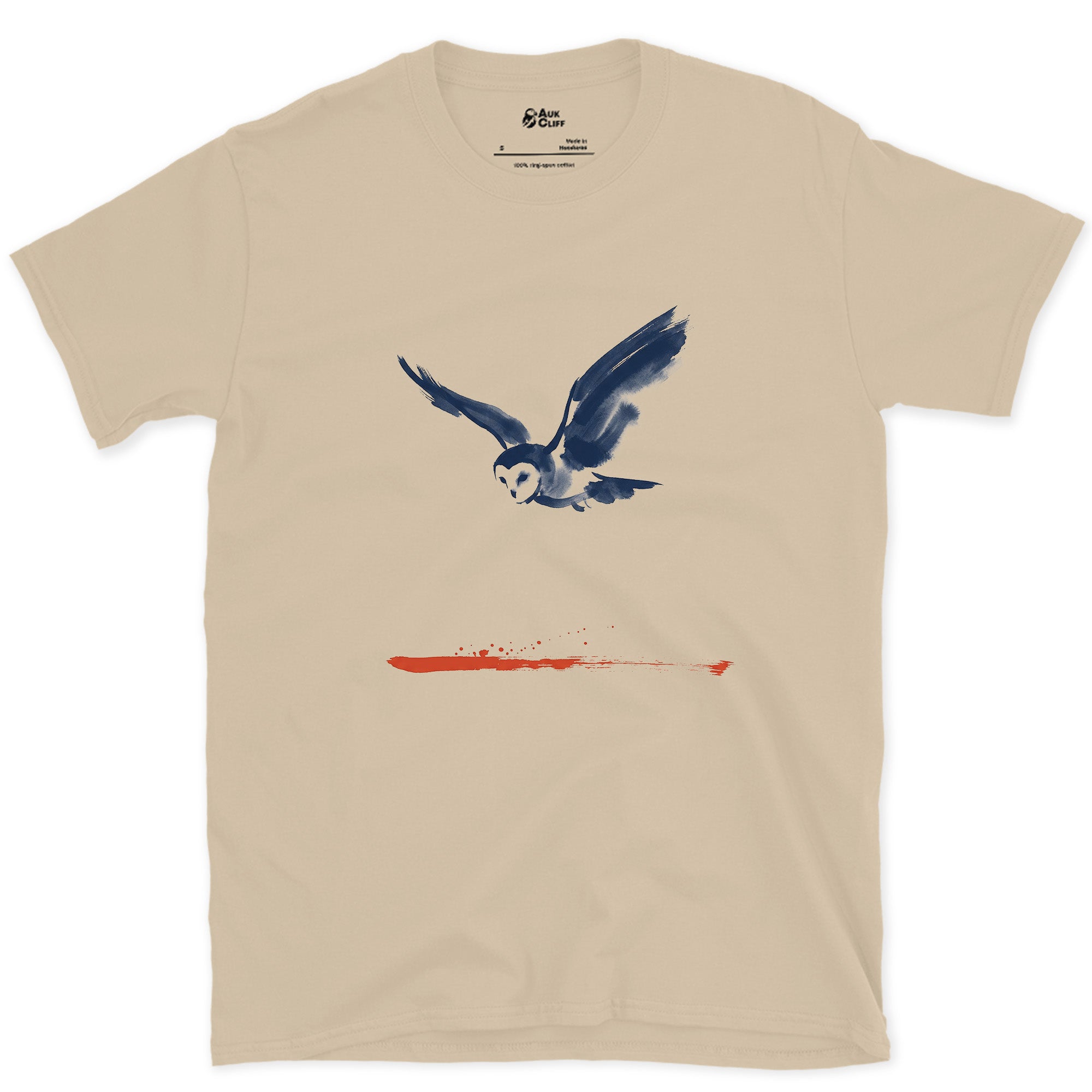 Owl in Flight Above a Red Horizon design on a Sand Gildan Softstyle t-shirt