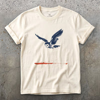 Owl in Flight Above a Red Horizon T-shirt