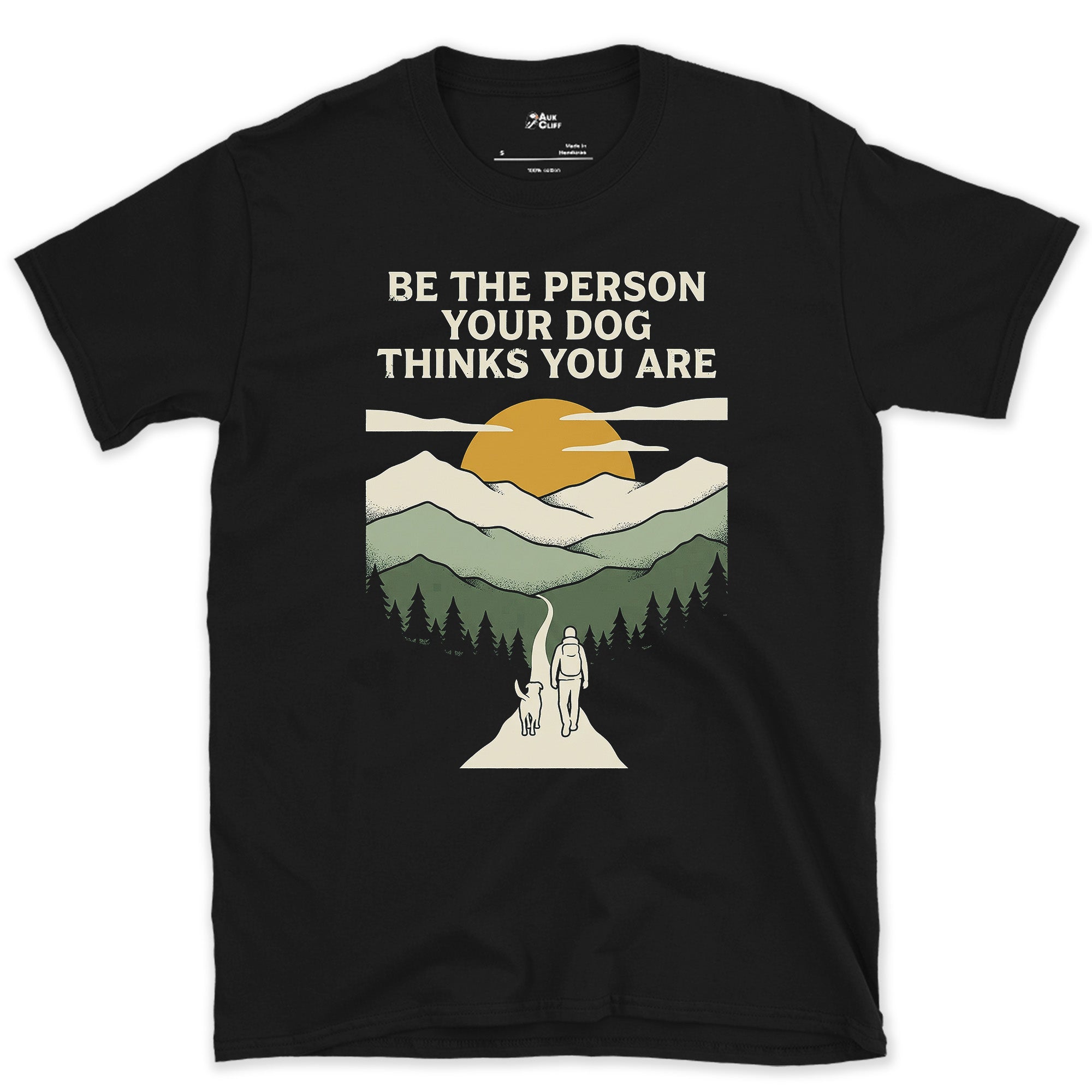 Be the Person Your Dog Thinks You Are on the Trail design on a Black Gildan Softstyle t-shirt