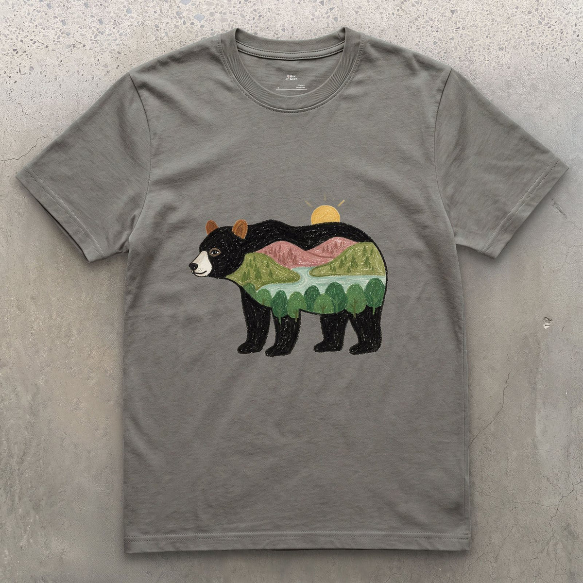 Sunrise Held by a Black Bear design on a Charcoal Gildan Softstyle t-shirt