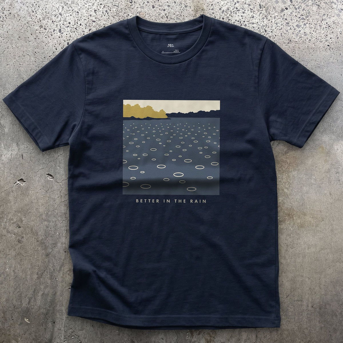 Better in the Rain Over the River design on a Navy Gildan Softstyle t-shirt